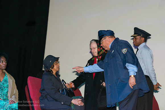 Rosa Parks being told to move by a police officer
